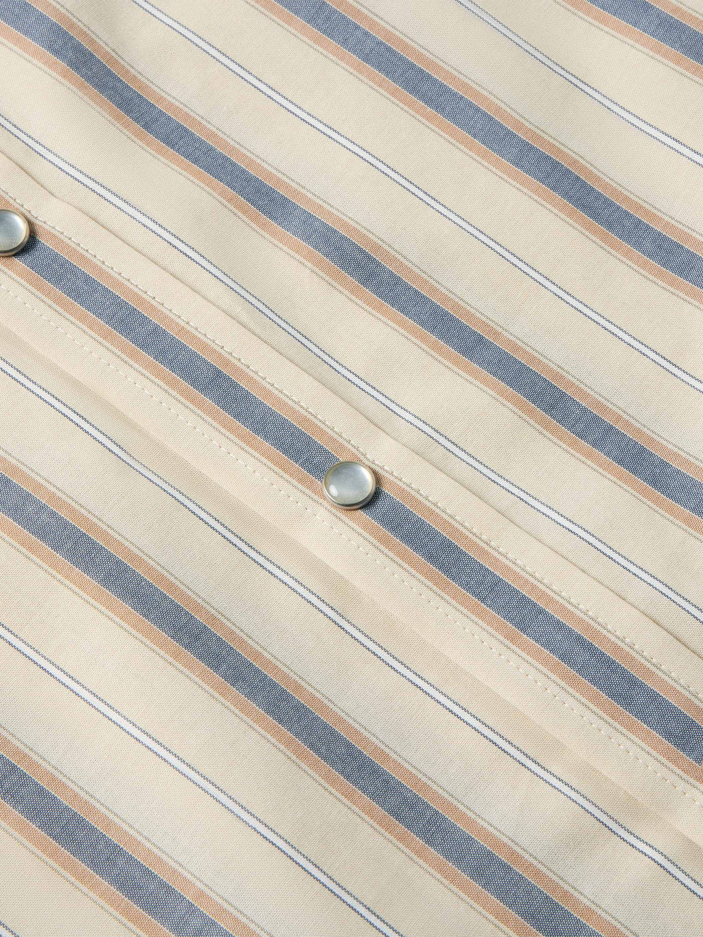 Striped cotton shirt placket with metal pearl snaps