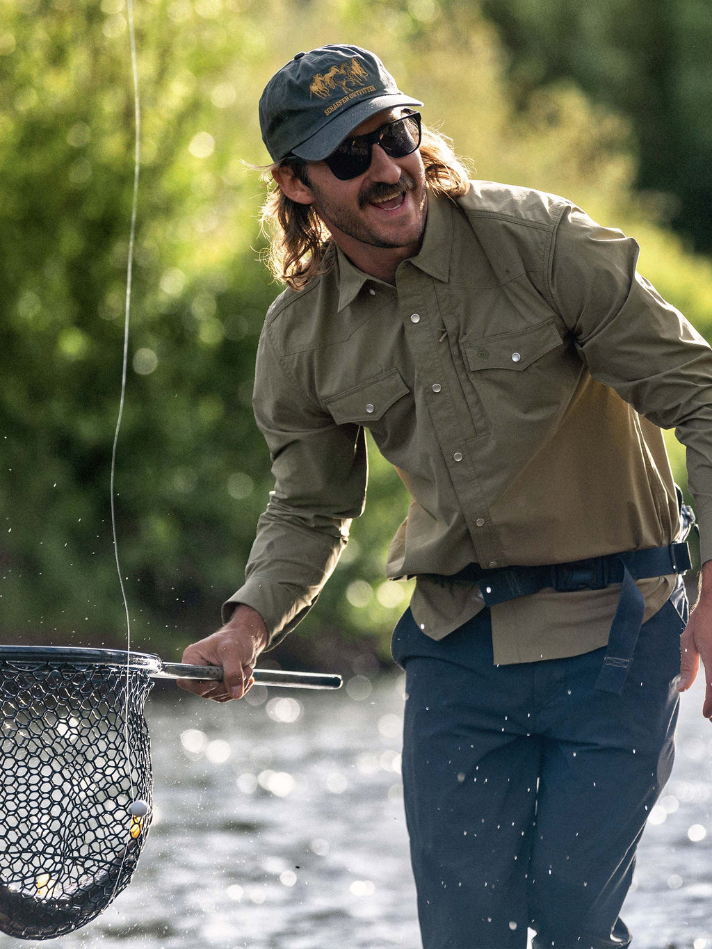 Olive western snap shirt with two chest pockets and snap button cuffs