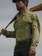 RangeTek olive western guide snap shirt on model, buttoned front and long sleeves