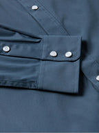 Navy shirt front with flap pocket and silver snap buttons