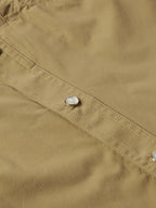 Olive western guide snap shirt front with silver-tone snap buttons and stitched panels