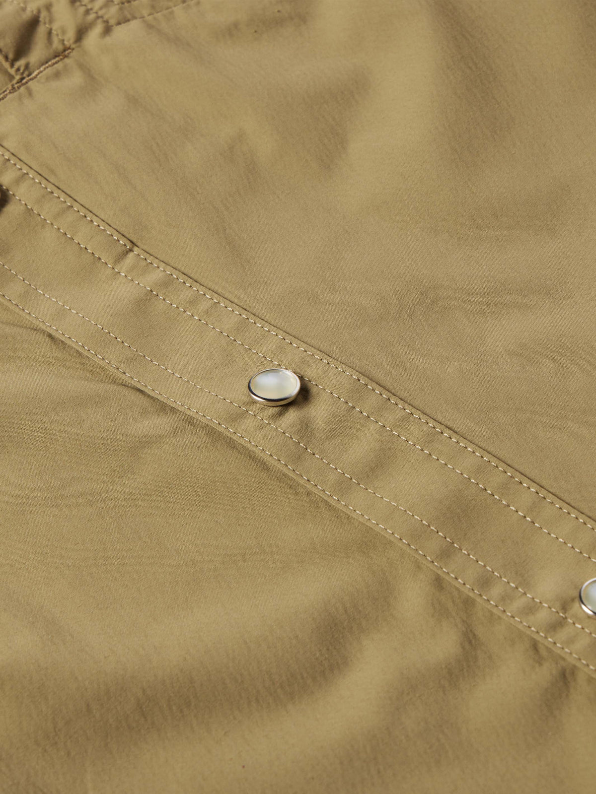 Olive western guide snap shirt front with silver-tone snap buttons and stitched panels