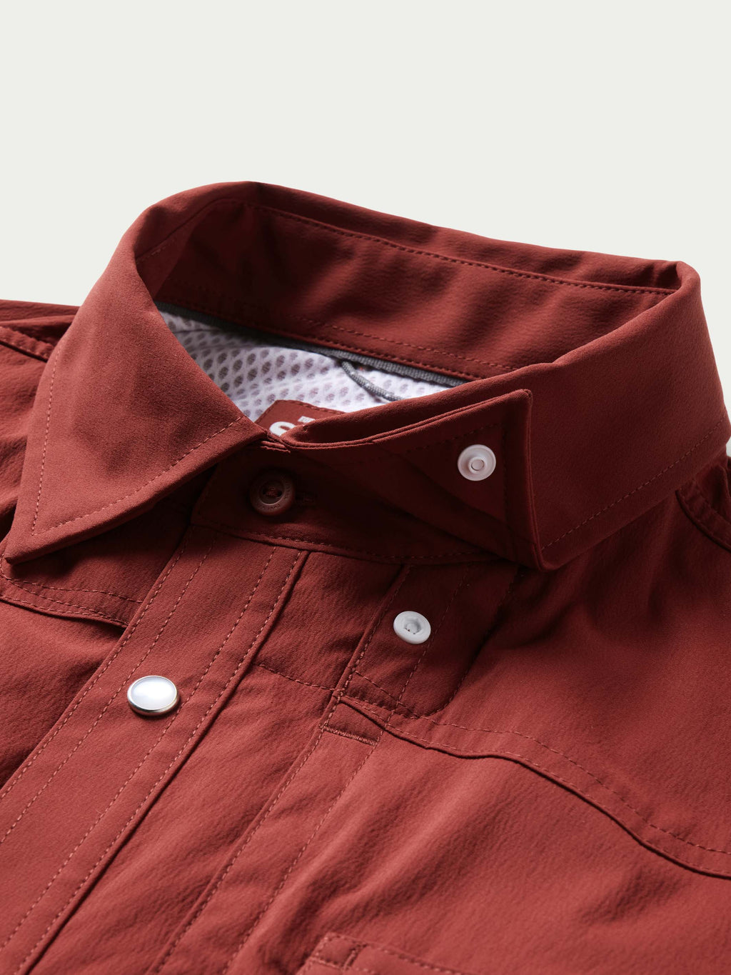 Oxblood snap-front western shirt with buttoned collar and top placket