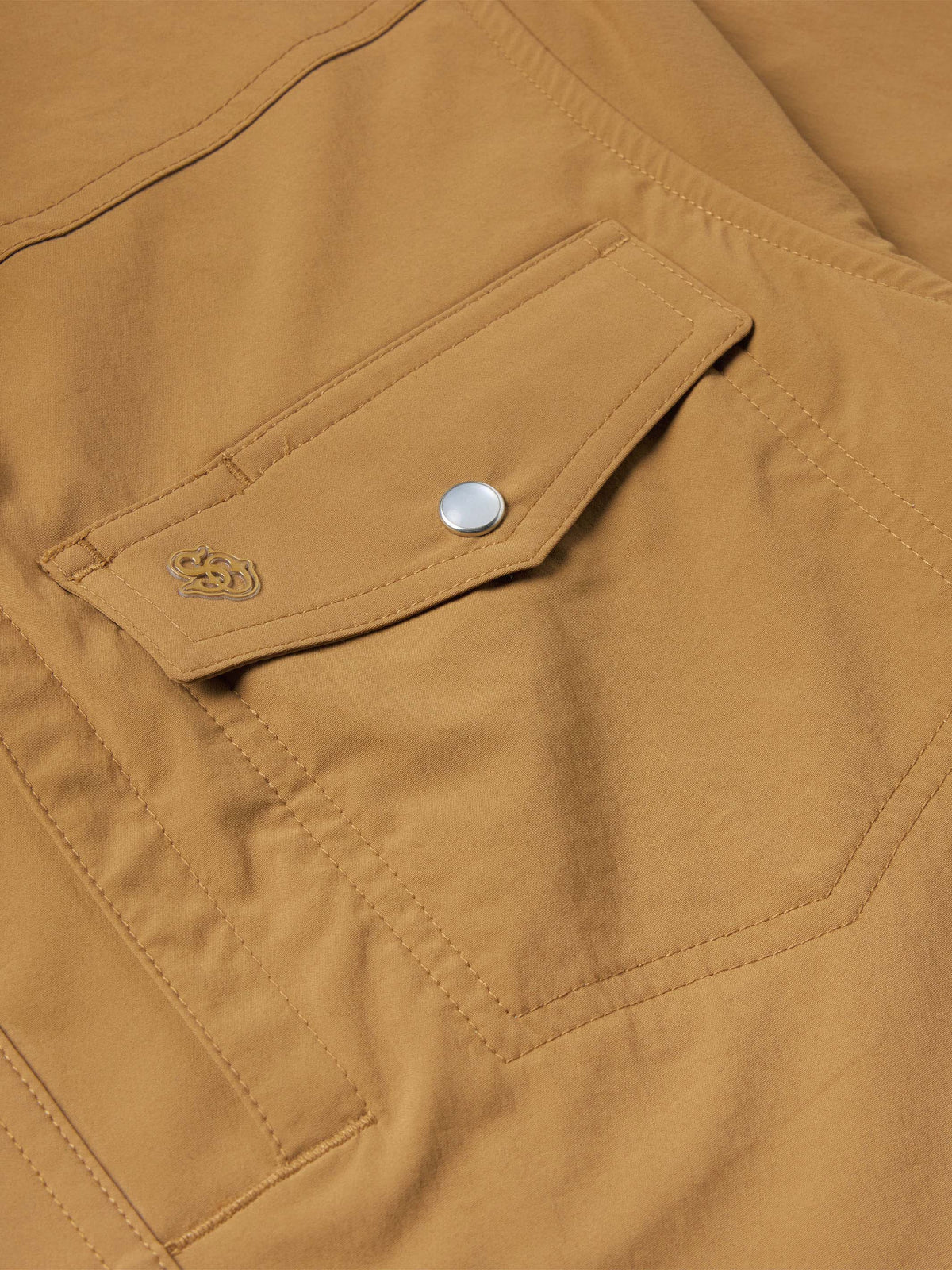 Pecan western snap shirt close-up of inner pocket tab and snap
