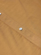 Pecan western snap shirt close-up of diagonal stitched panel with metal snaps