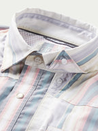 Inside collar and placket view of pastel striped western snap shirt with snap hardware