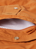Rust snap shirt pocket lining with zipper and patterned interior