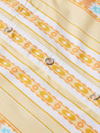 Western snap shirt front placket with three metal snaps and cream-orange Aztec stripe pattern