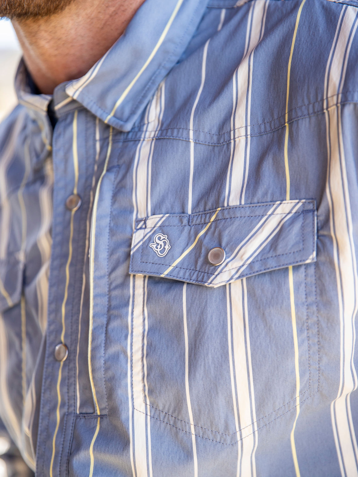 RangeTek western snap shirt in light blue with white and yellow stripe chest pocket