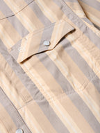 Striped western snap shirt detail with buttoned collar and chest yoke metal snaps