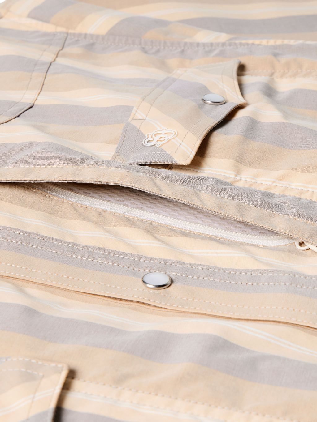 Striped western snap shirt with curved yoke and metal snap placket, logo detail