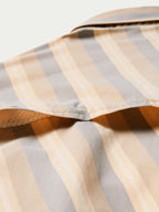 Striped western shirt collar and shoulder seam with snap closure and folded fabric