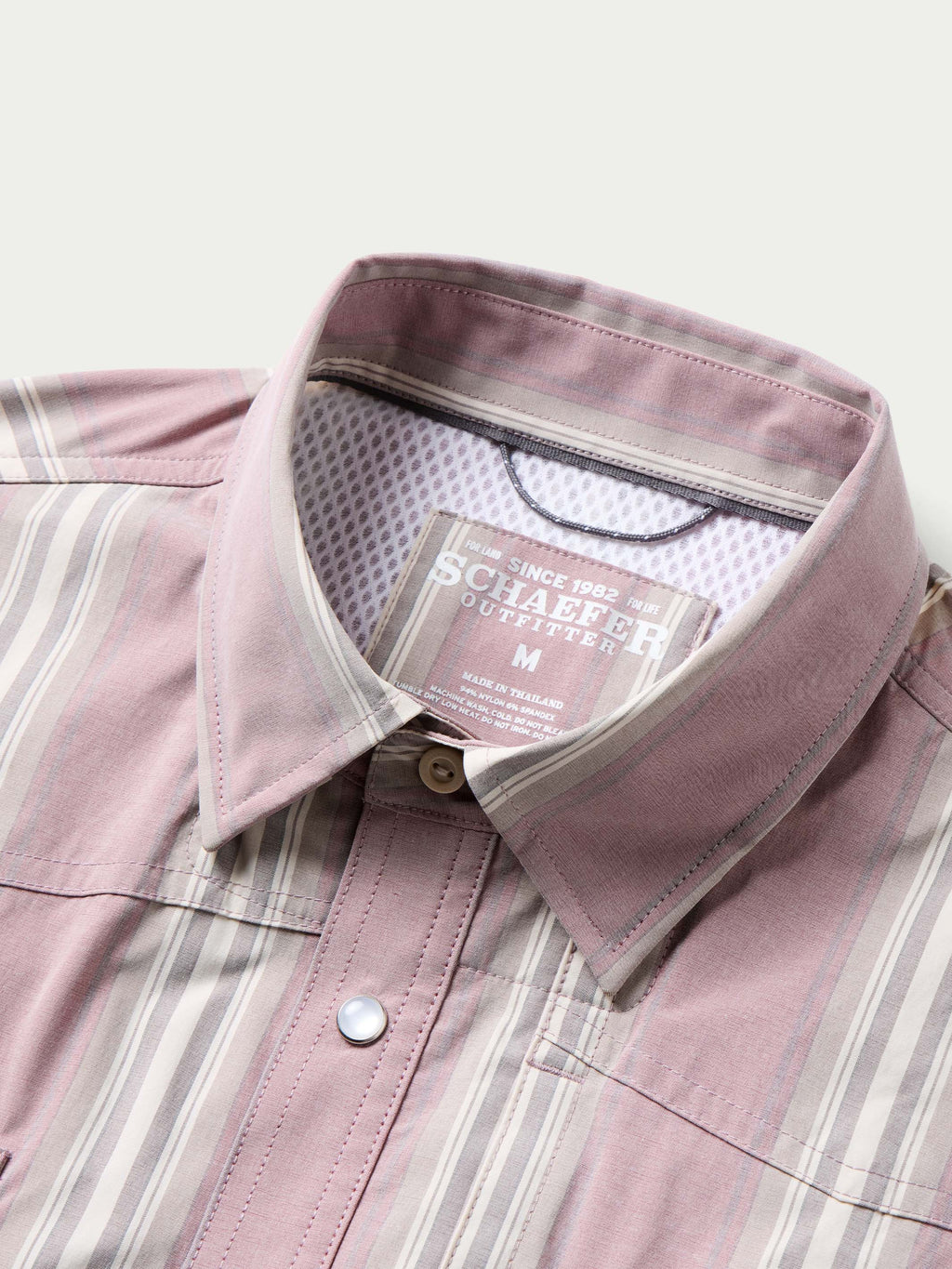 Pink striped button-up shirt close-up of collar and inner neck label, size M