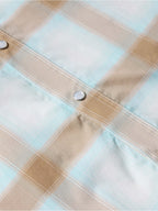 Western snap shirt in light blue and tan plaid, chest button and stitched placket