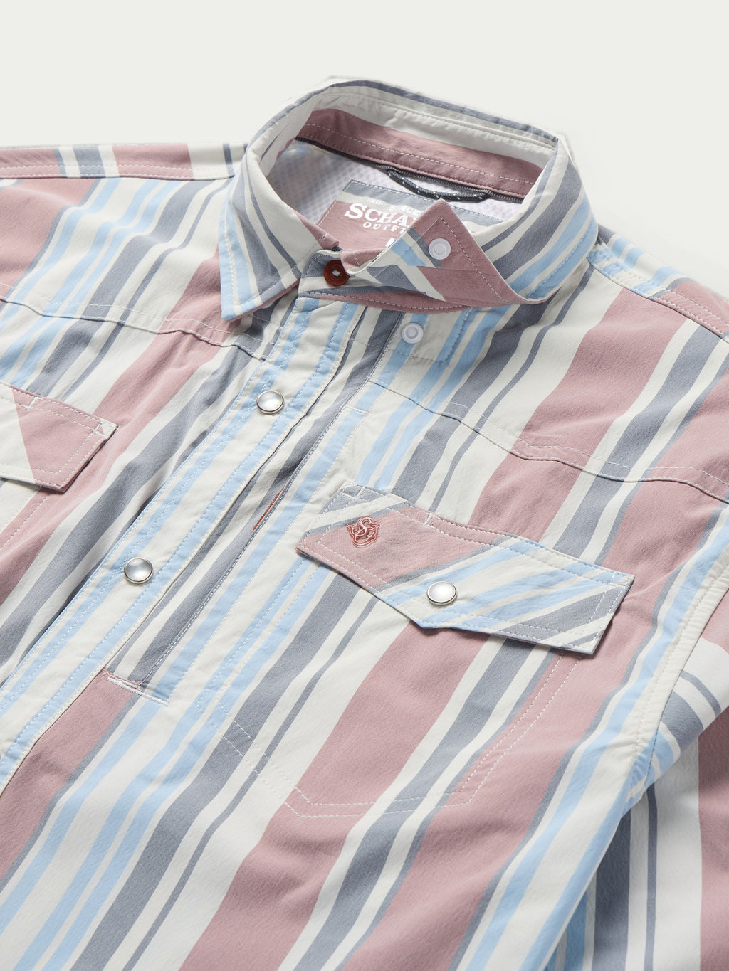 Western snap shirt with buttoned collar and chest pocket, pink and light blue stripes