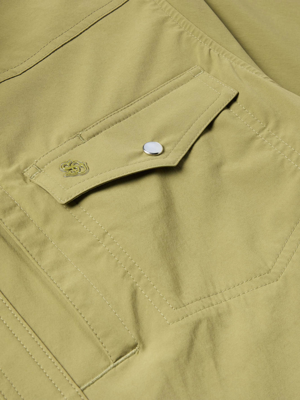 Olive short-sleeve snap shirt chest pocket flap with snap and embroidered emblem