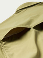 Olive short-sleeve snap western shirt close-up of collar and shoulder seam