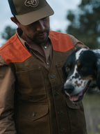 RangeWax® Mesquite vest front view with orange shoulders and two chest pockets.