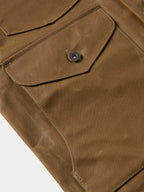 Mesquite vest tan pocket flap with snap detail and stitched seams