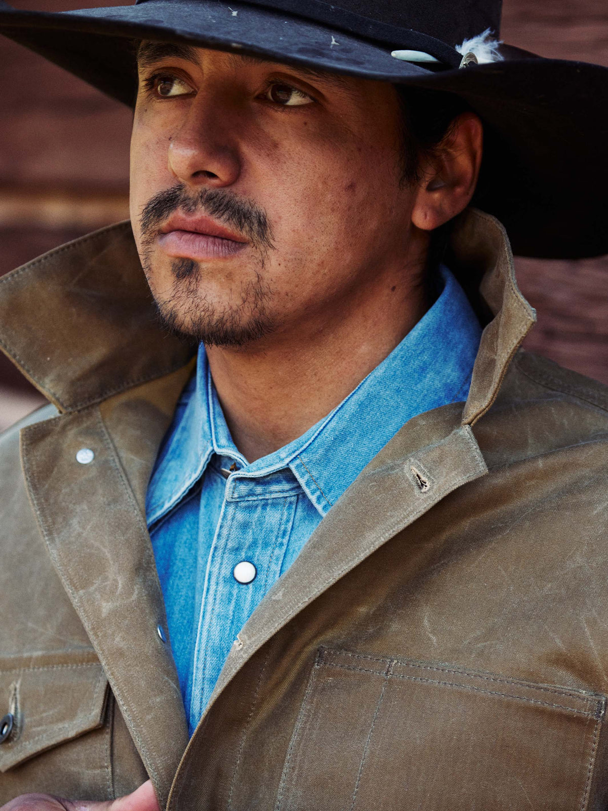 Sand brush jacket with button front, flap pockets, and dark collar lining detail