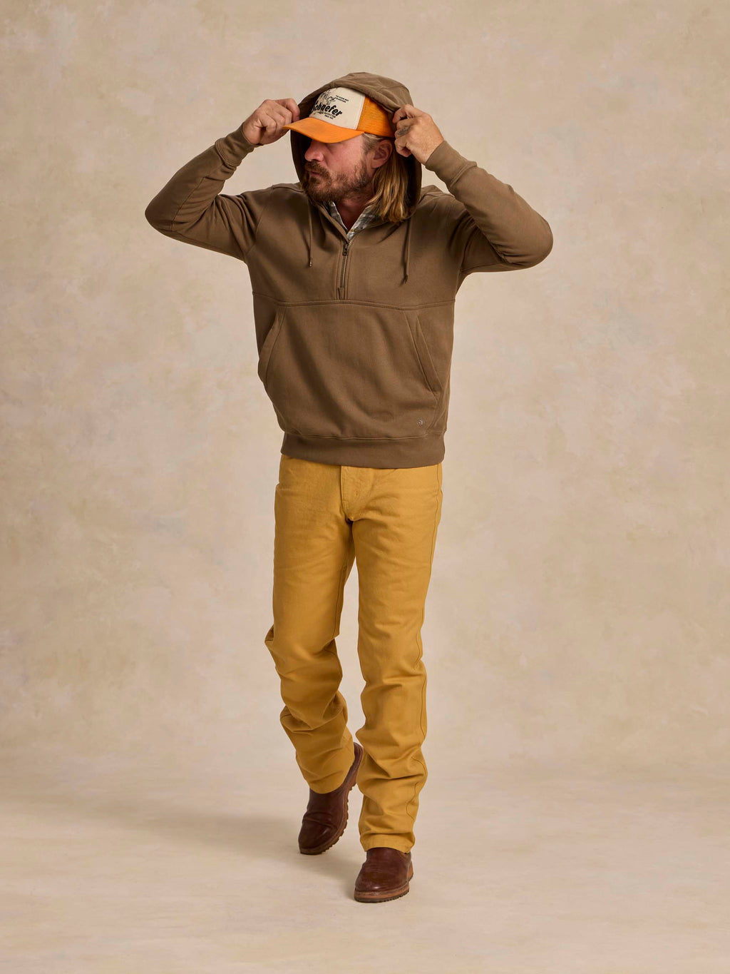 Olive cotton hoodie with drawstring hood and kangaroo pocket, front view