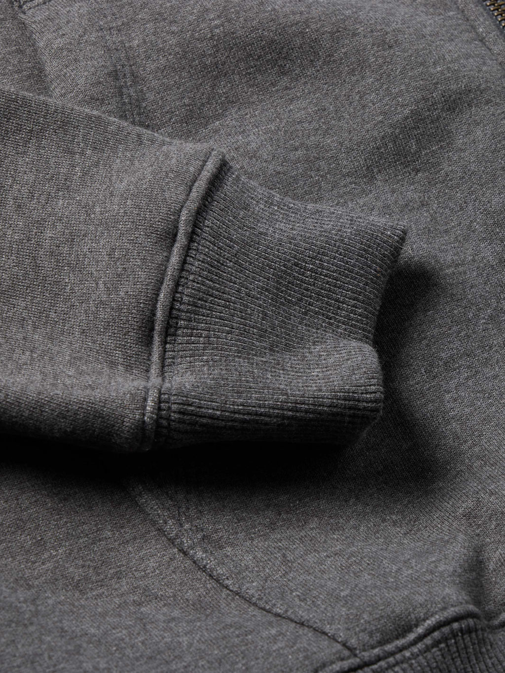 Heather charcoal hoodie cuff and sleeve hem with knit texture and stitching detail