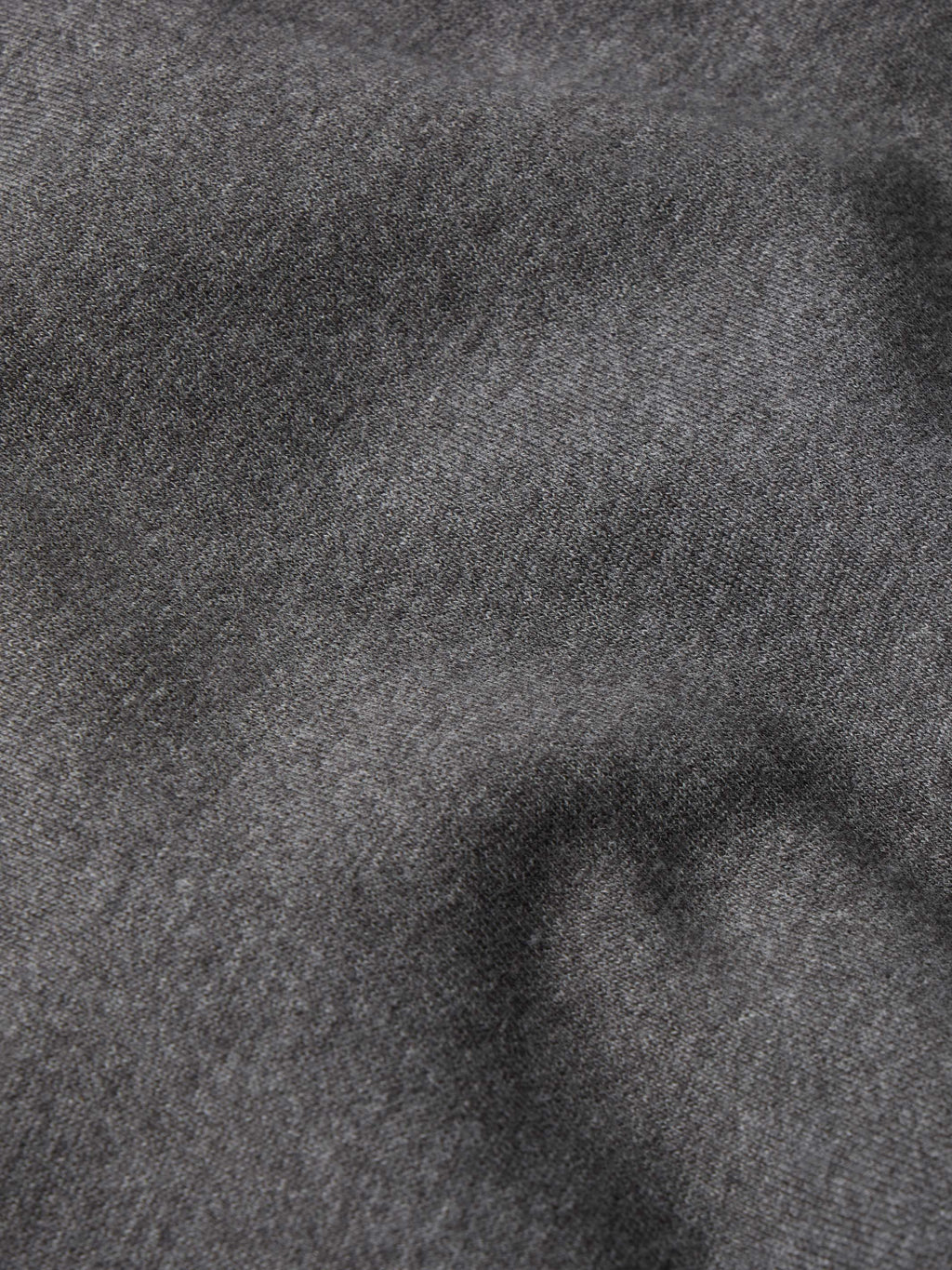 Heather charcoal heathered fabric close-up with fine texture
