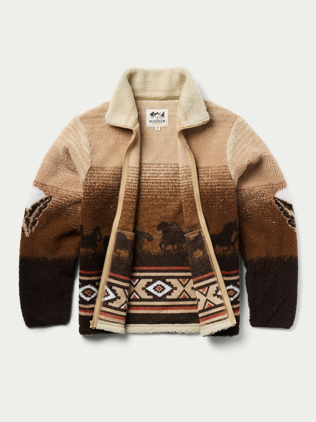 Tan and dark brown full-zip fleece jacket with horse scene front and contrast patterned band