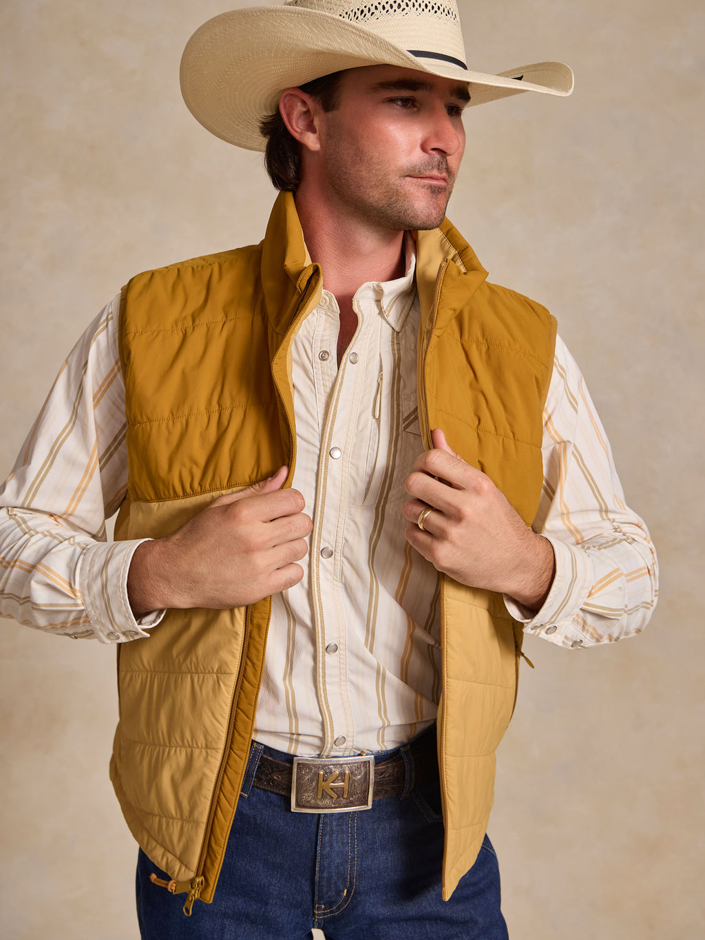 Tan ultralight nylon vest with front zipper and stand collar, quilted fabric