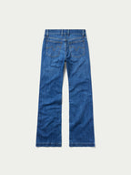 Medium-wash straight-leg jeans, back view with two back pockets and belt loops.