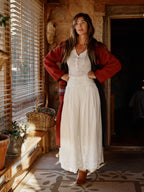Vintage white tiered midi skirt with gathered elastic waist and scalloped hem