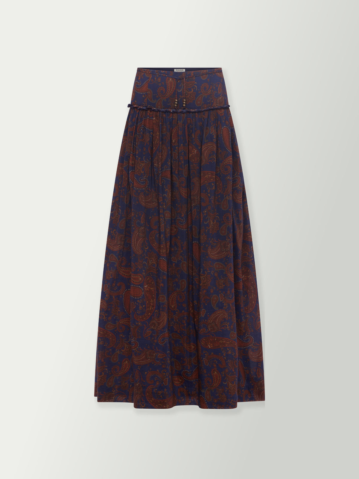 Long paisley print skirt in dark blue with rust tones, elastic waist and soft drape.
