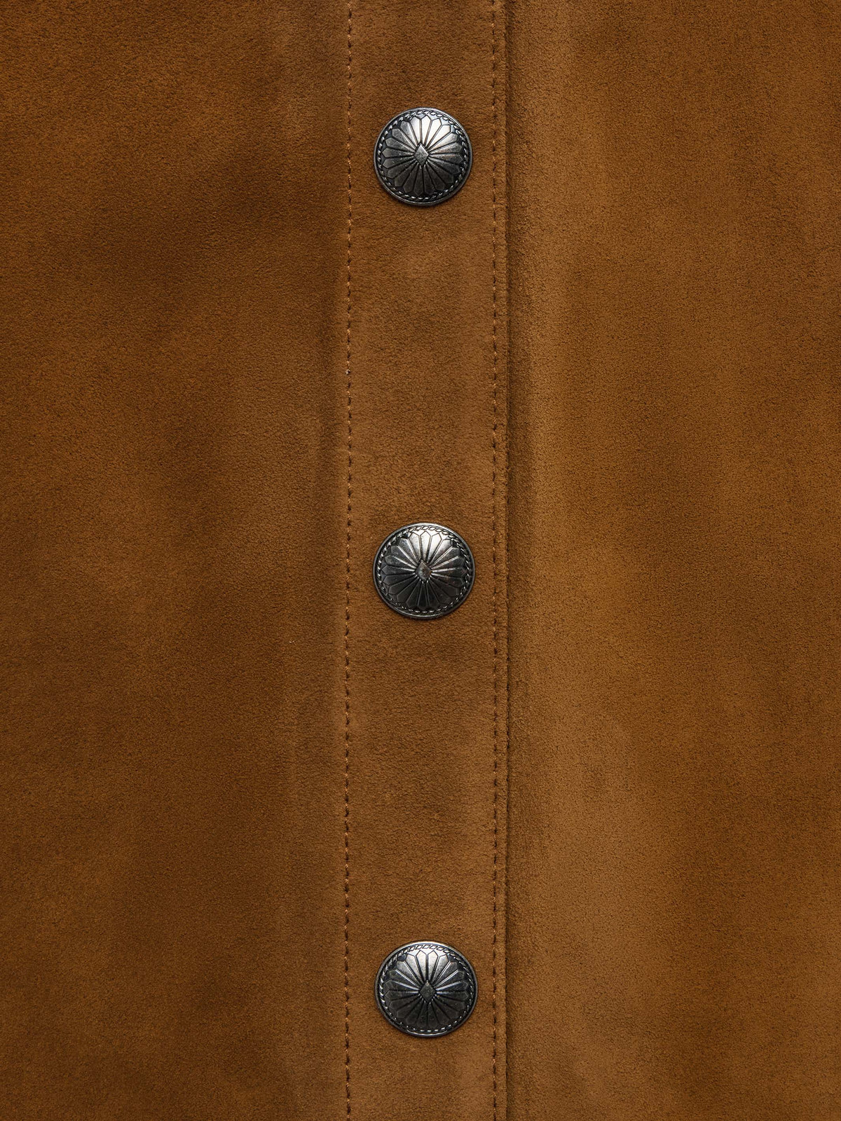 Tuscany suede skirt placket detail with round metal snap buttons