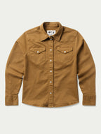 Women’s fawn snap-front denim shirt with two chest flap pockets and pointed collar.