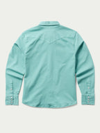 Turquoise women's snap-front denim shirt, back view with yoke seam and buttoned collar