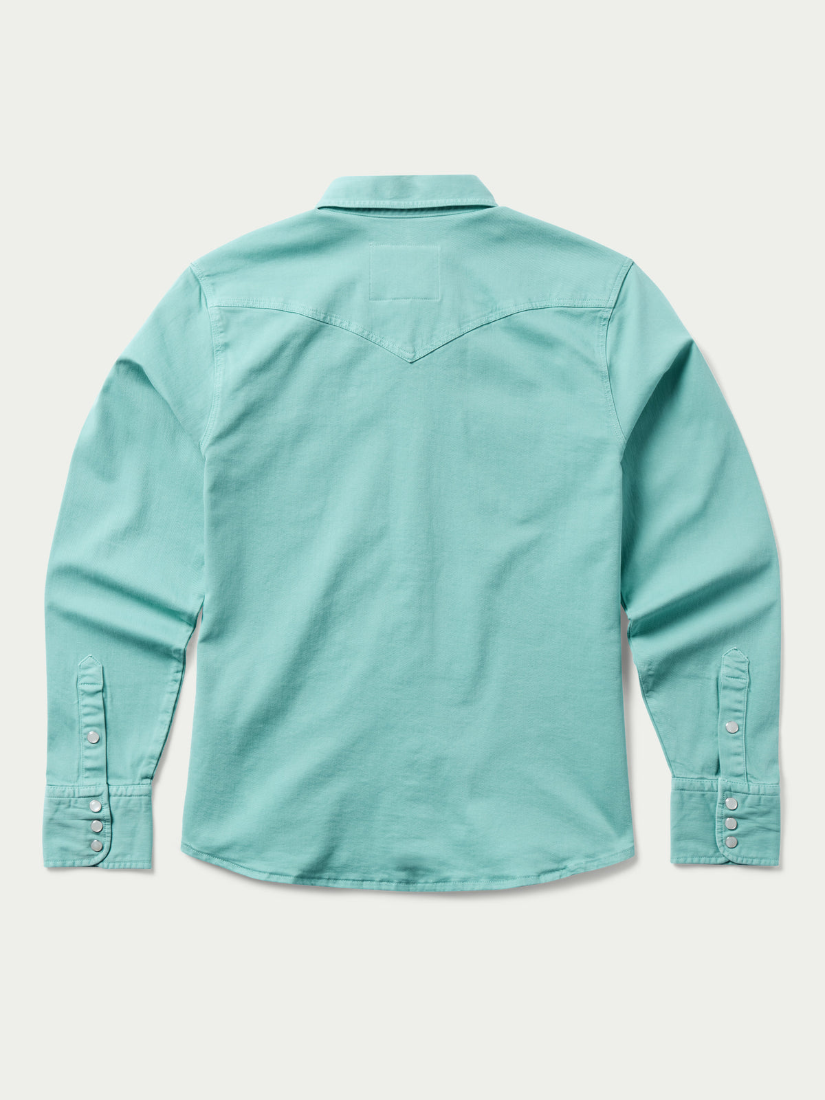 Turquoise women's snap-front denim shirt, back view with yoke seam and buttoned collar