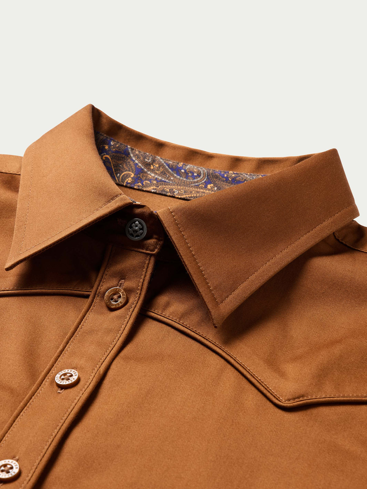 Women’s dark caramel shirt with pointed collar; paisley-lined inner placket