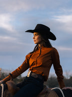 Women’s button-up shirt in dark caramel with pointed collar and long sleeves