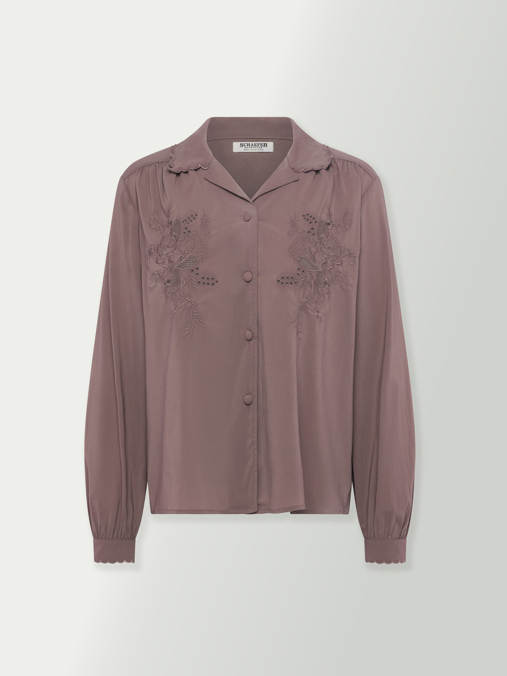 Washed plum blouse front with stand collar and lace-like embroidery on the chest