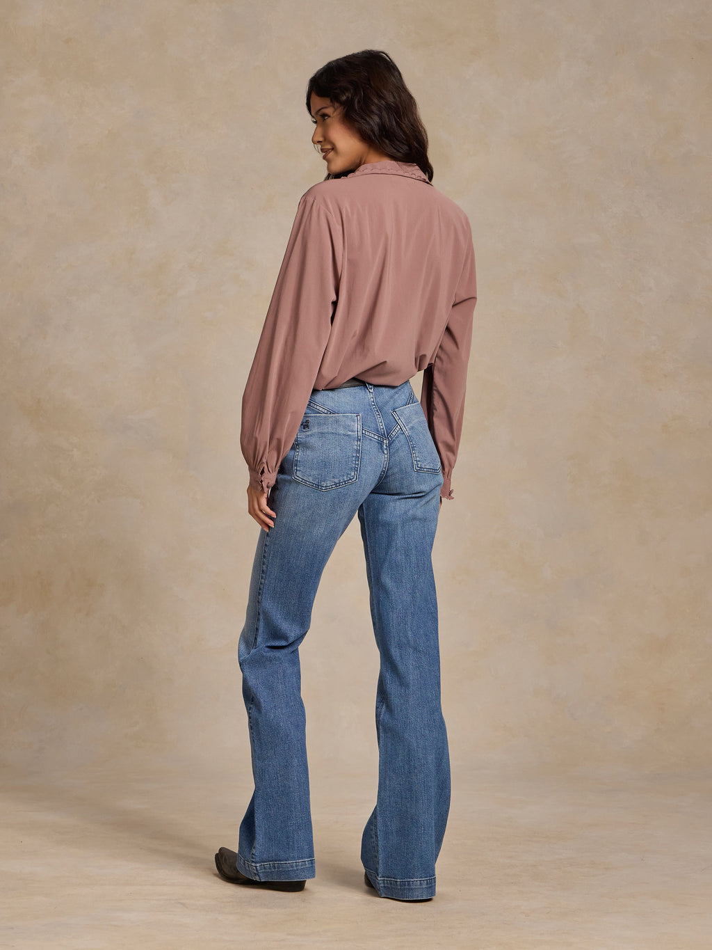 Washed plum blouse with long sleeves and button back