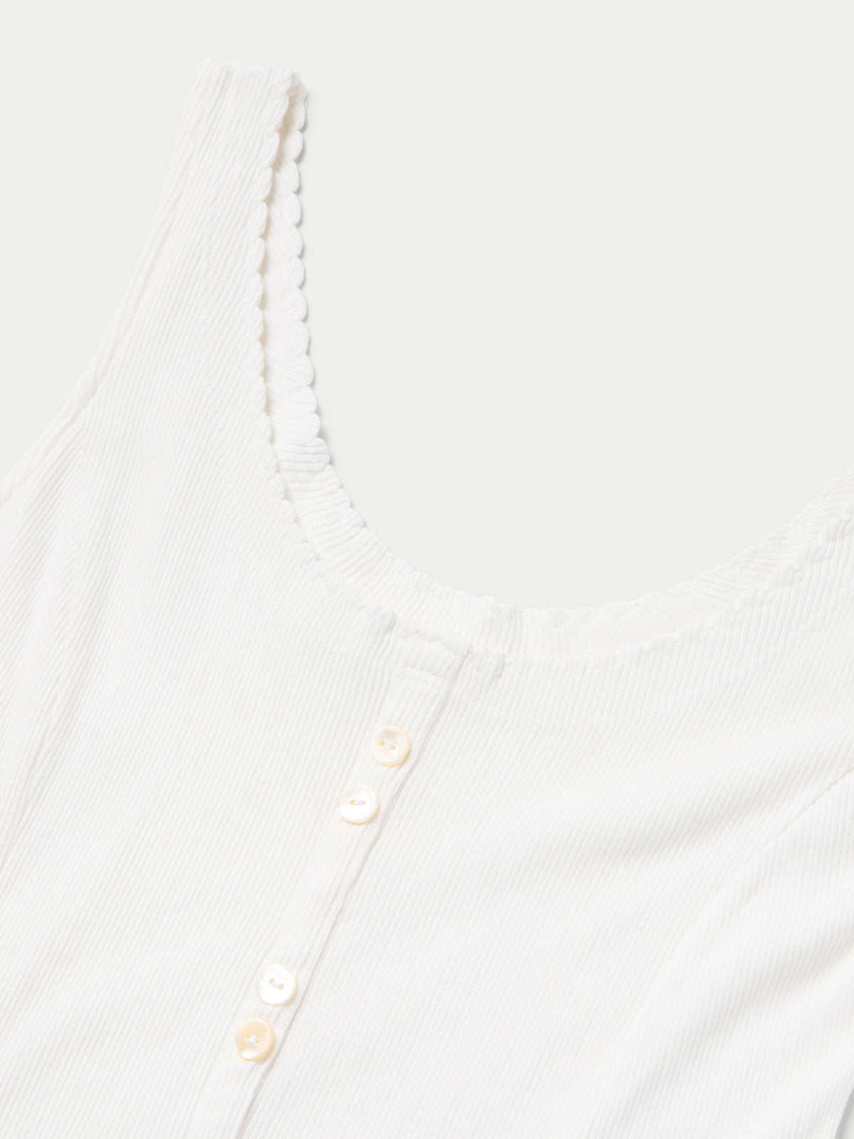 Bone scoop-neck sleeveless dress with scalloped trim and button placket