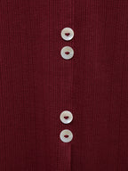 Wine ribbed knit fabric close-up with white button trim