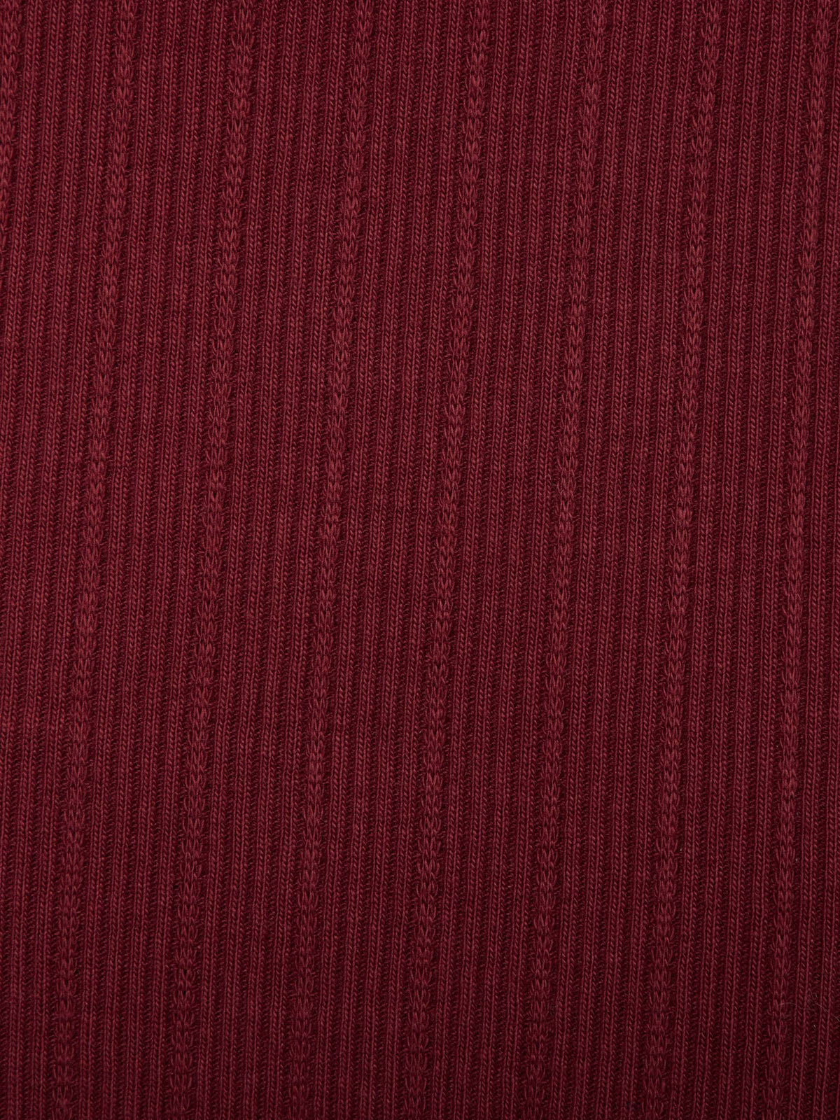 Wine ribbed knit fabric texture close-up