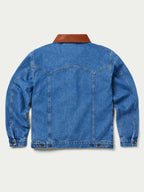 Back view of medium indigo denim jacket with brown collar and button cuffs