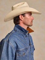 Medium indigo denim jacket with pointed collar and buttoned chest pocket
