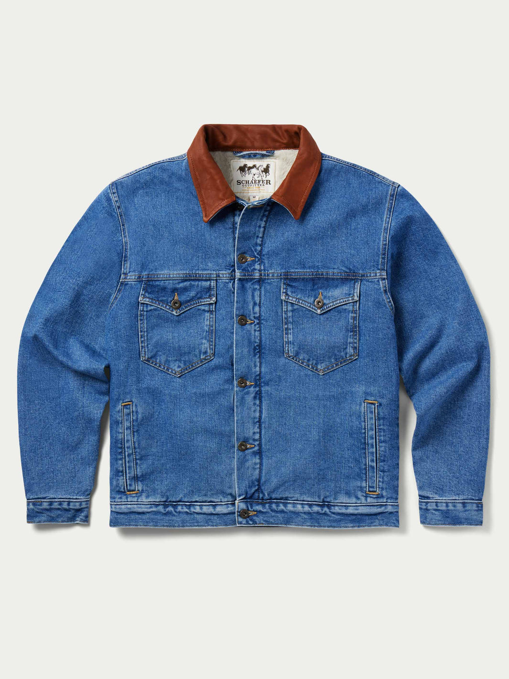 Indigo denim jacket front view with two chest pockets and button closure