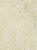 Cream sherpa lining fabric close-up