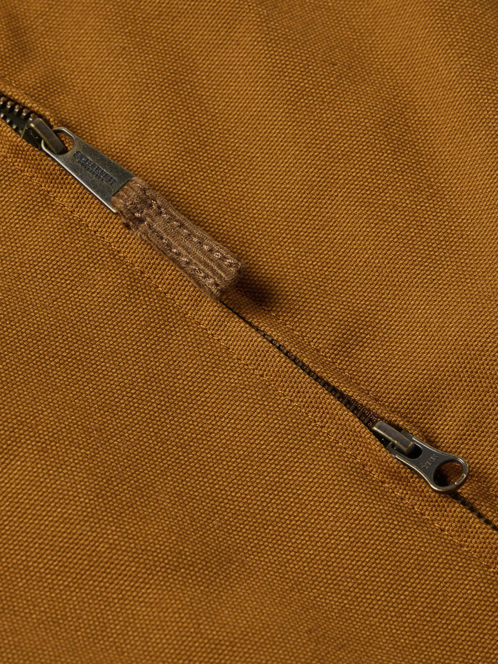 Sandstone canvas vest zipper with metal pull and stitched placket