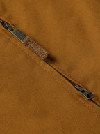 Sandstone canvas vest zipper with metal pull and stitched placket