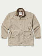 Beige drifter coat with brown stand collar, button front, and two chest flap pockets